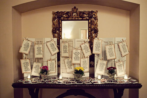 Old doors and windows make lovely place seating charts for your wedding.